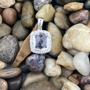 Amethyst and White Topaz pendant set in 925 Sterling Silver