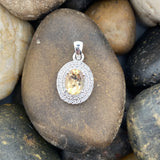 Beryl and White Topaz pendant set in 925 Sterling Silver