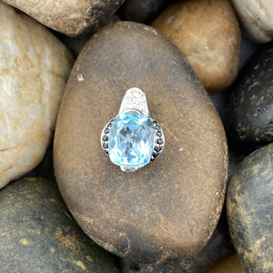 Blue Topaz and Spinel pendant set in 925 Sterling Silver