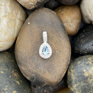 Blue Topaz and Diamond pendant set in 925 Sterling Silver
