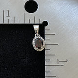 Garnet and White Topaz pendant set in 925 Sterling Silver