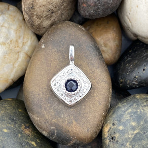 Iolite pendant set in 925 Sterling Silver