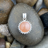 Peach Moonstone and White Topaz pendant set in 925 Sterling Silver