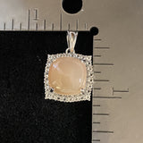 Peach Moonstone and White Topaz pendant set in 925 Sterling Silver
