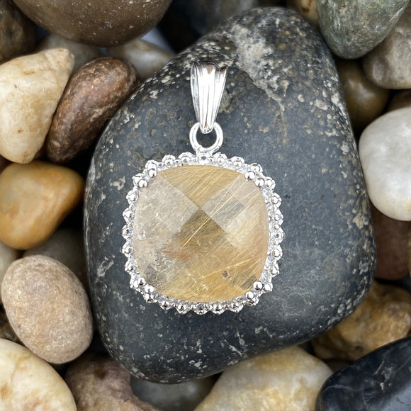 Rutilated Quartz and White Topaz pendant set in 925 Sterling Silver