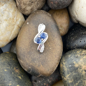 Sapphire and White Topaz pendant set in 925 Sterling Silver