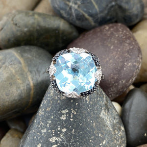 Blue Topaz, Spinel and White Topaz ring set in 925 Sterling Silver